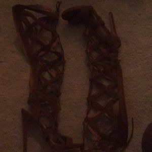 Knee high caged boots